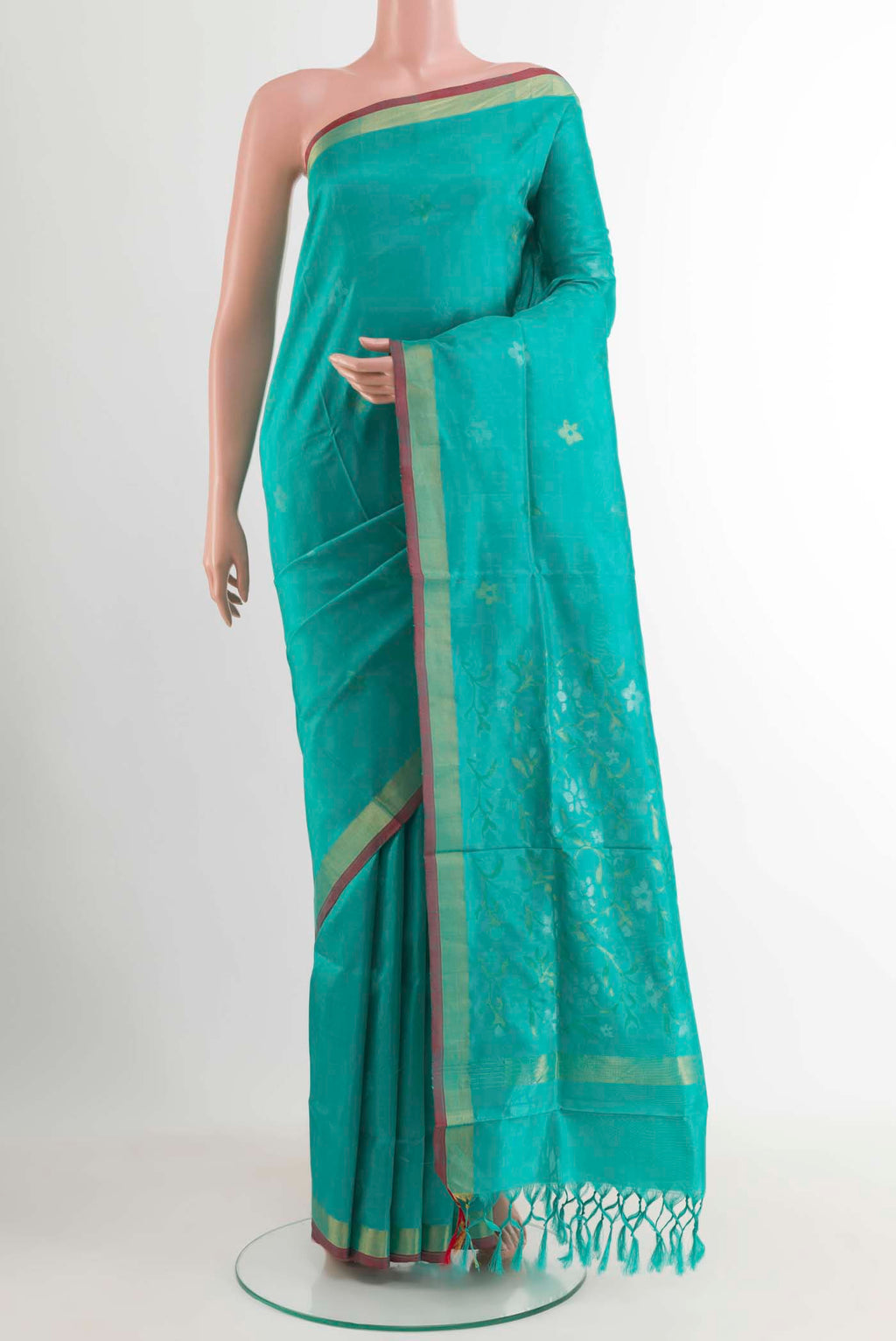 Turquoise Uppada Silk Saree with Zari Butta on the body and Zari Border displayed on a mannequin