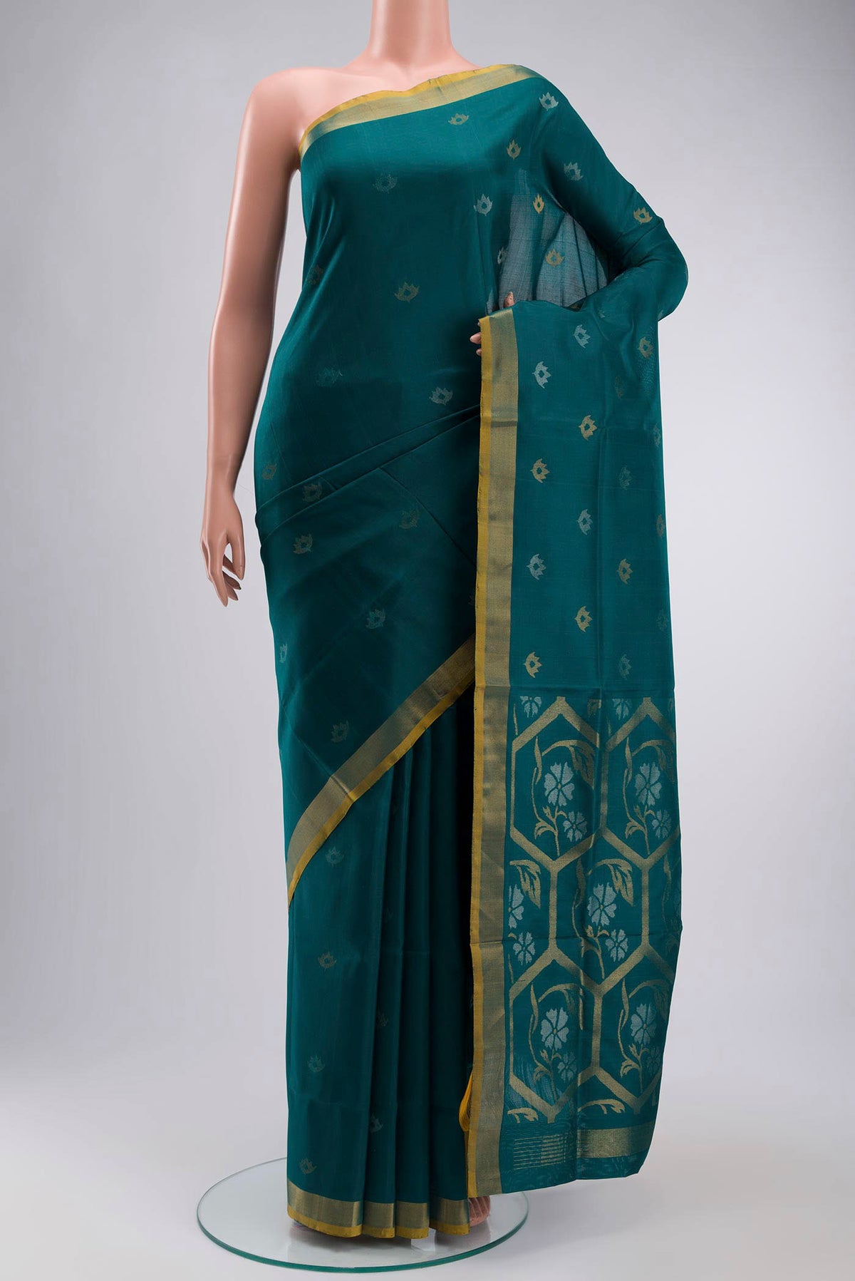 Blue Uppada Silk Saree with Zari Butta on the body and Zari Border displayed on a mannequin