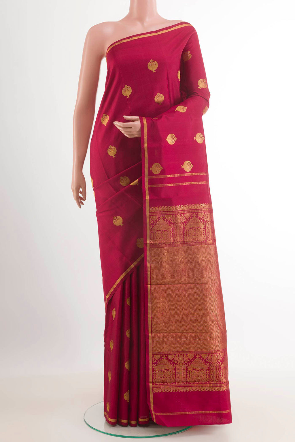 Maroon Dual Tone Kanjivaram Silk Saree with Zari Butta on the body and Zari Border.  displayed on a mannequin