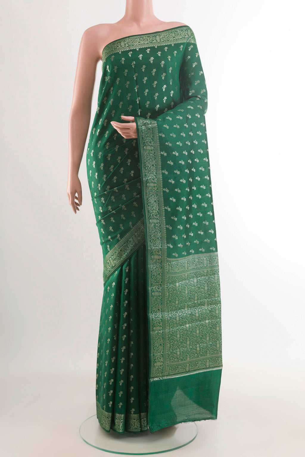 Green Banarasi Raw Silk Saree with Zari Butta on the body and Zari Border displayed on a mannequin