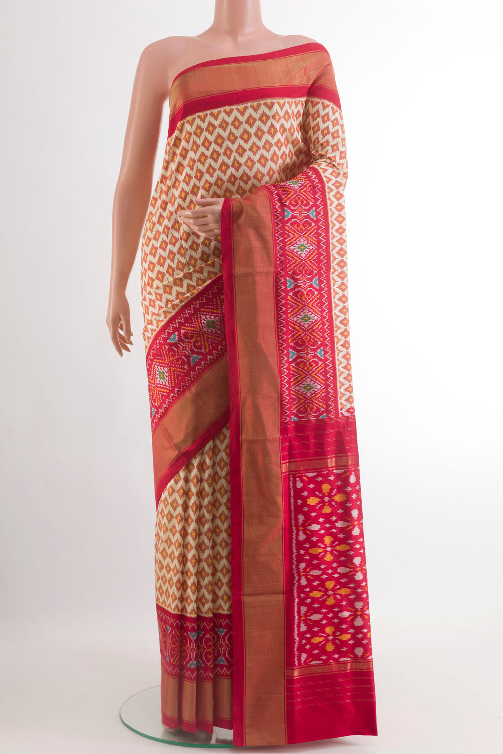 Cream Pochampally Silk Saree with Pure Ikat on the body and Zari Border.  displayed on a mannequin