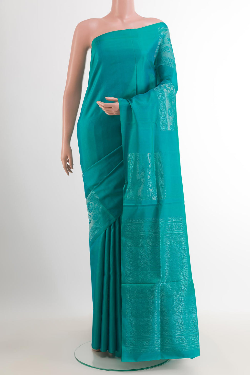 Blue Dual Tone Soft Silk Saree with Zari Butta on the body and Zari Border.  displayed on a mannequin