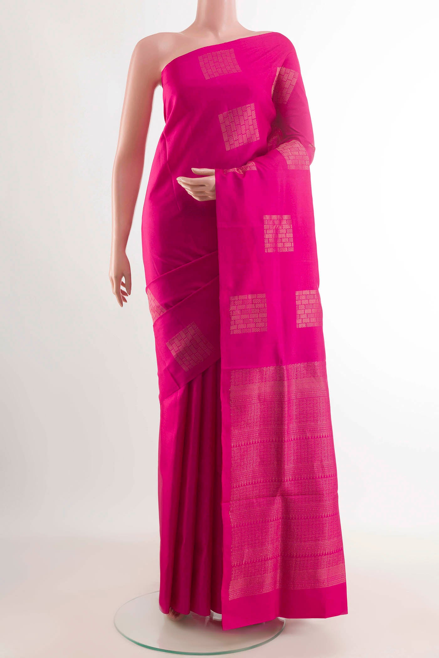 Pink Soft Silk Saree with Zari Butta on the body and Without Border displayed on a mannequin