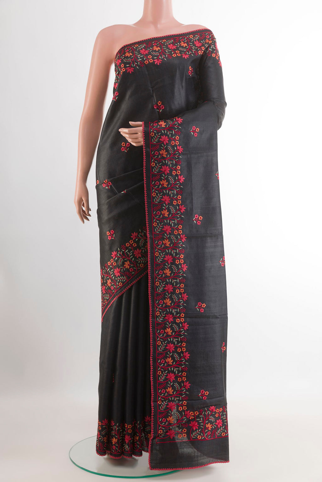 Black Tussar Saree with Thread Butta on the body and Embroidery Border.  displayed on a mannequin