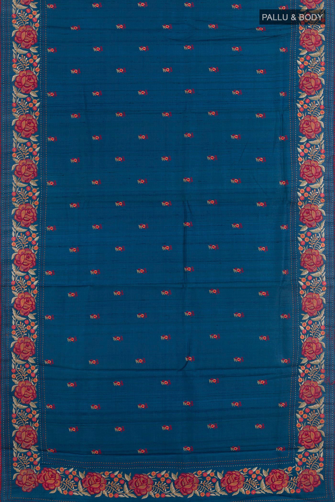 Flat view of Blue Tussar Saree with Thread Butta on the body and Embroidery Border. 