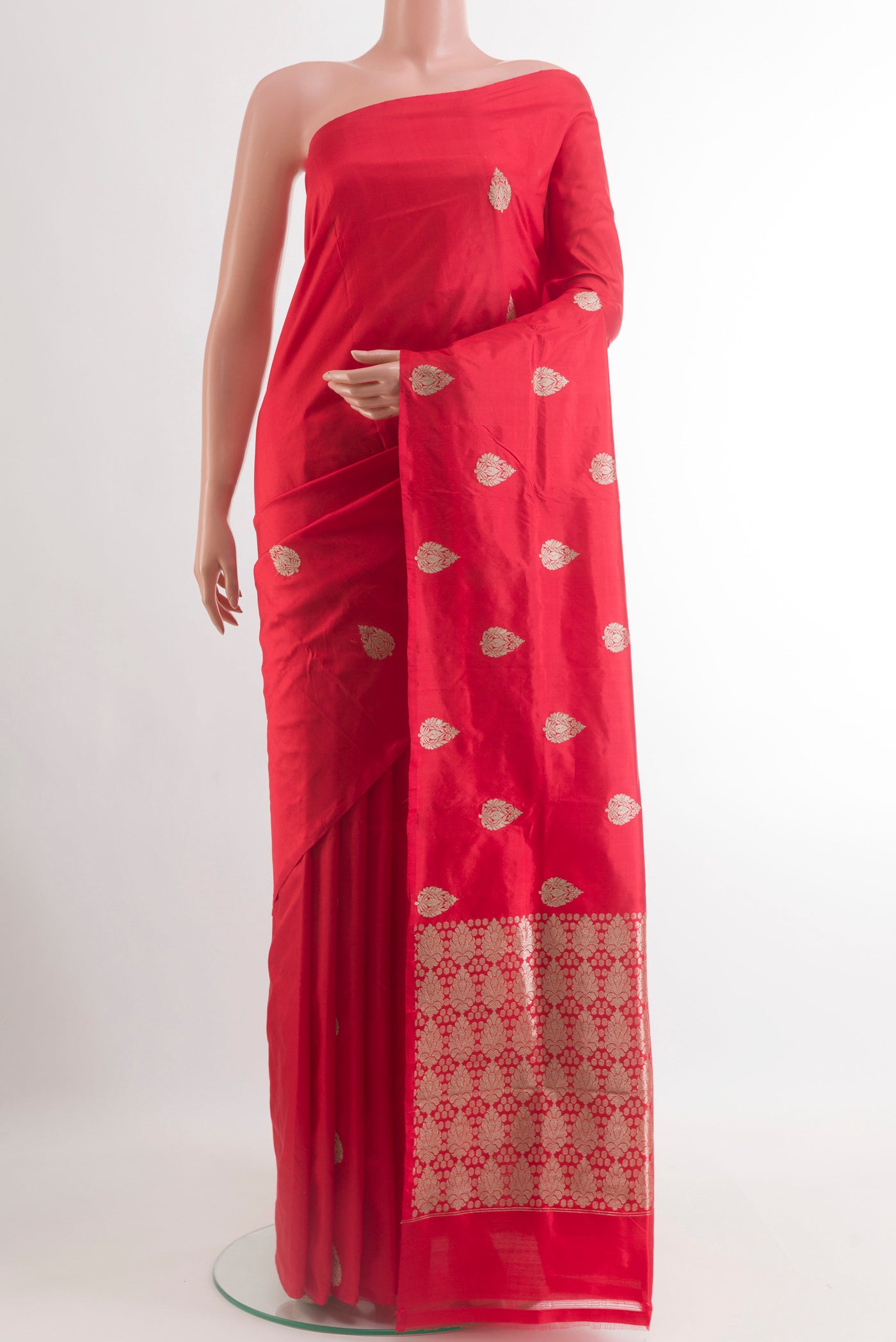 Red Banarasi Katan Silk Saree with Zari Butta on the body and Without Border.  displayed on a mannequin