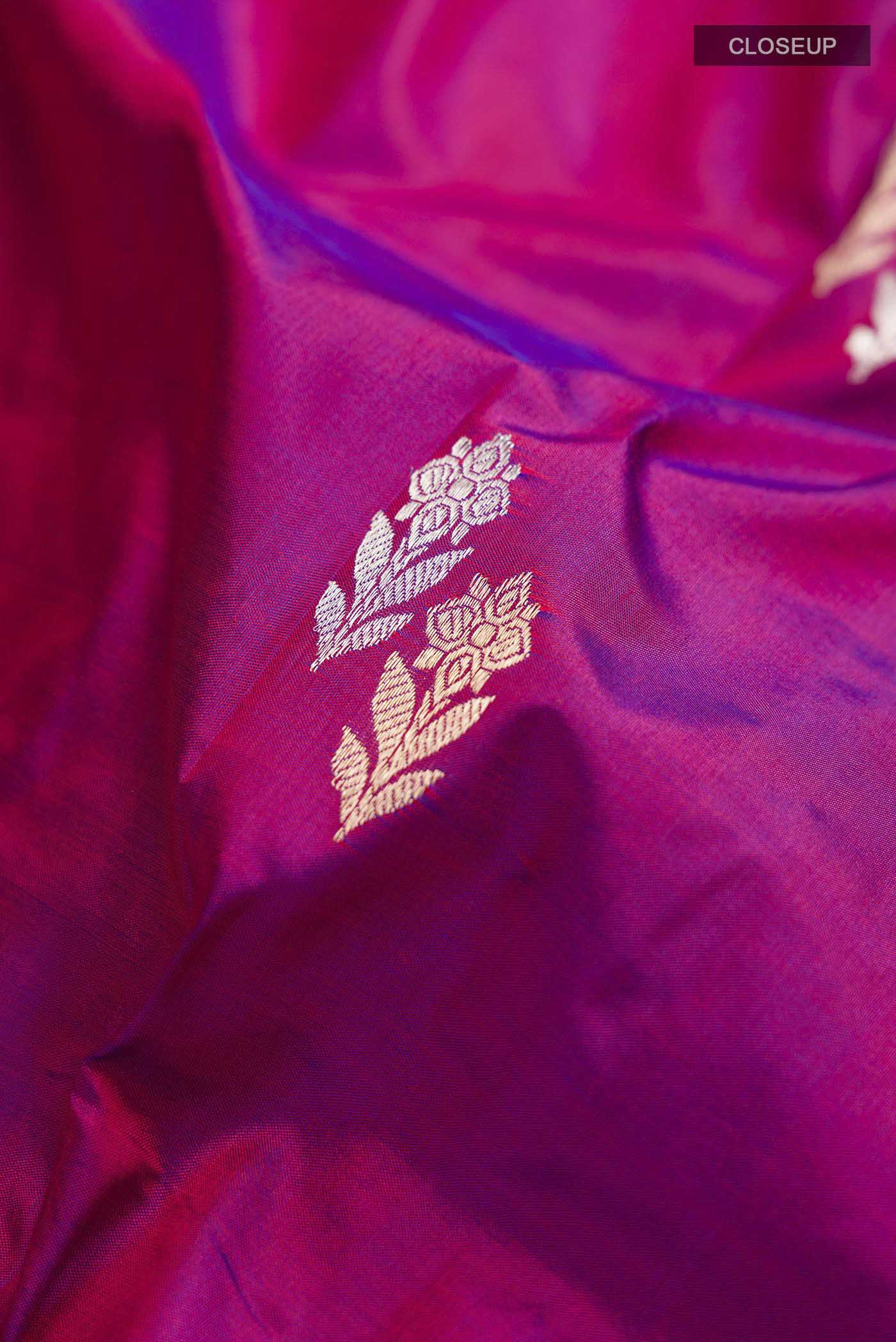 Close up of Purple Banarasi Katan Silk Saree with Zari Butta on the body and Zari Border displaying folds