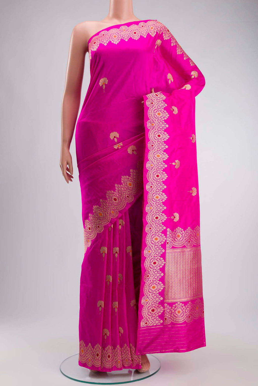 Rani Pink Banarasi Katan Silk Saree with Zari Butta on the body and Zari Border displayed on a mannequin