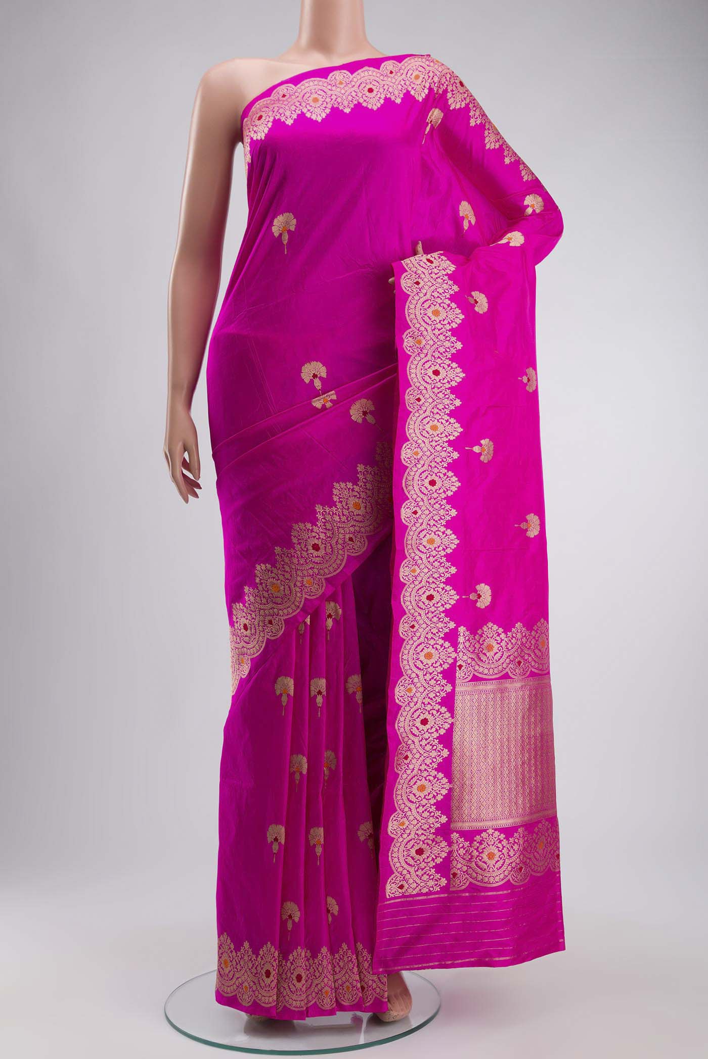Rani Pink Banarasi Katan Silk Saree with Zari Butta on the body and Zari Border displayed on a mannequin