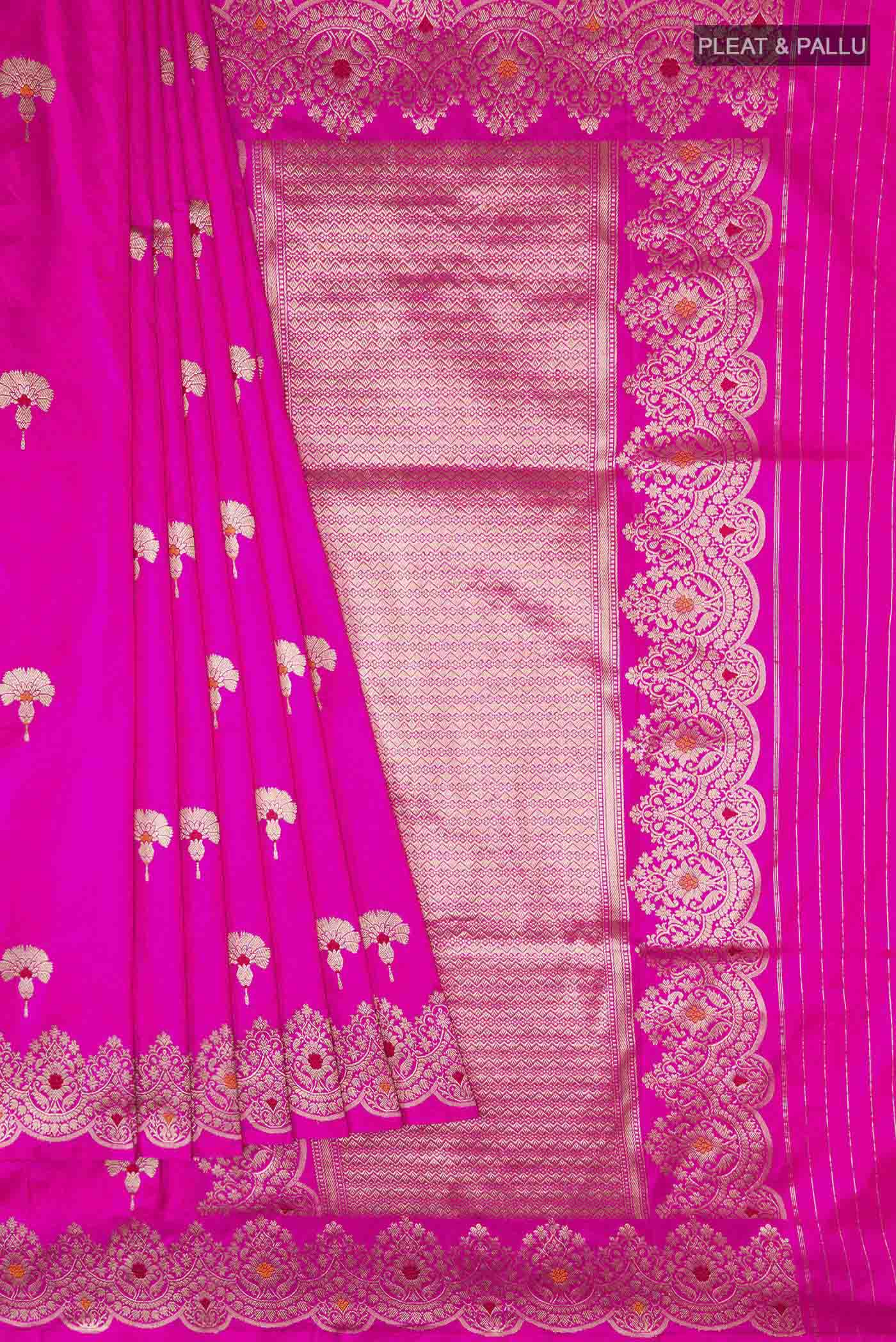 Pleats and pallu of Rani Pink Banarasi Katan Silk Saree with Zari Butta on the body and Zari Border