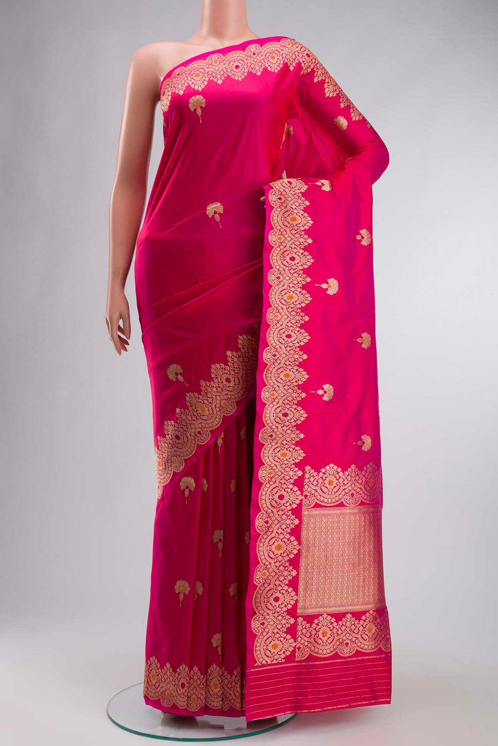 Pink Banarasi Katan Silk Saree with Zari Butta on the body and Zari Border displayed on a mannequin