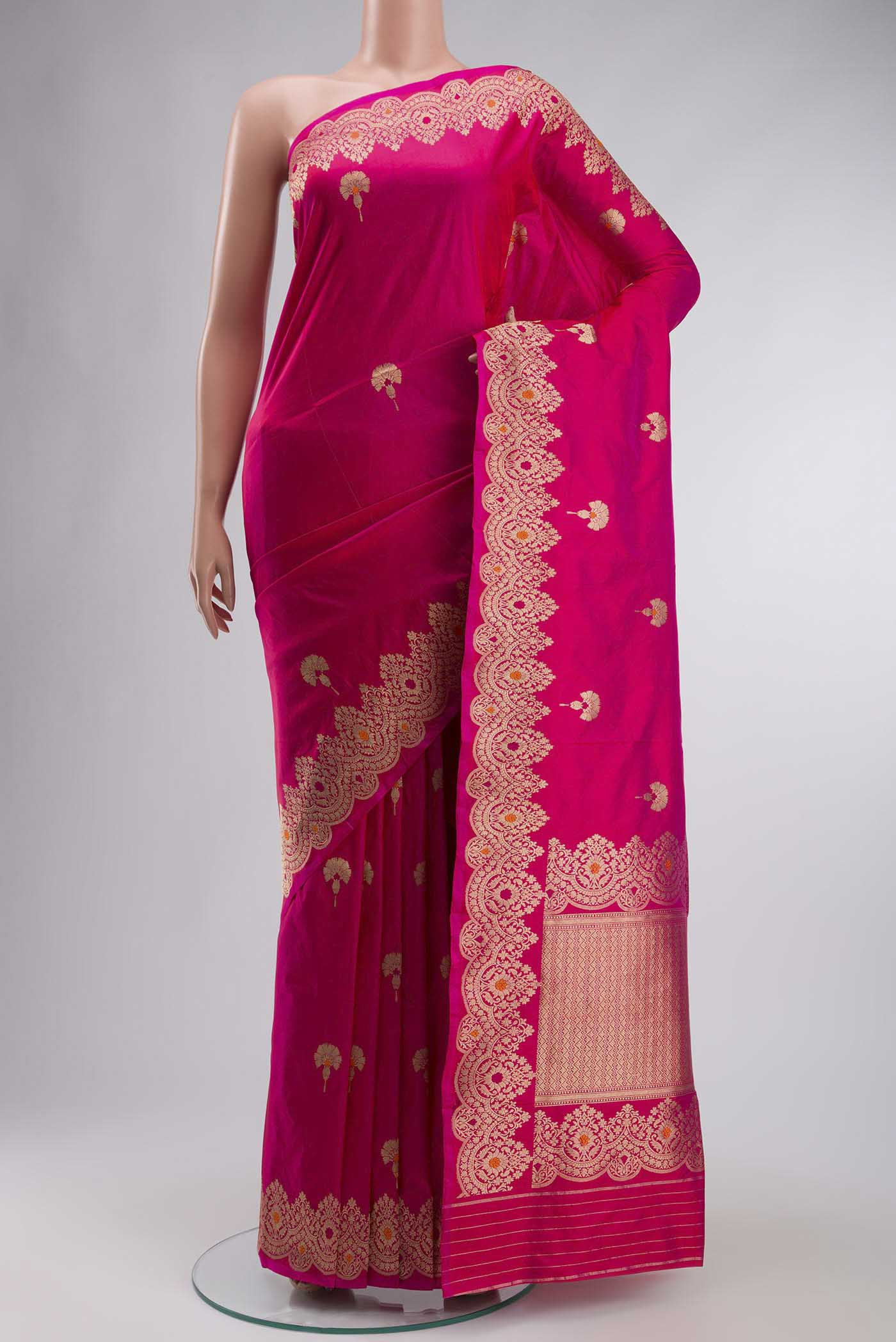 Pink Banarasi Katan Silk Saree with Zari Butta on the body and Zari Border displayed on a mannequin
