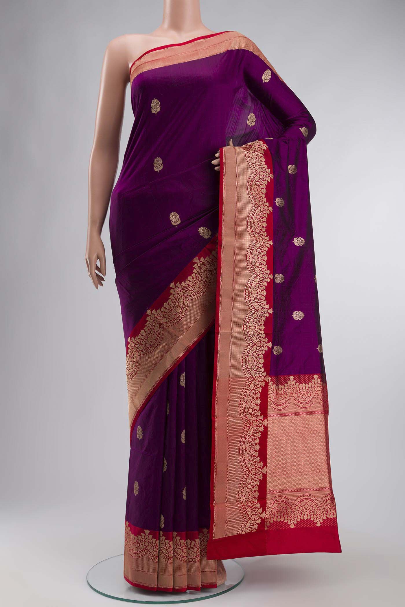 Violet Banarasi Katan Silk Saree with Zari Butta on the body and Zari Border displayed on a mannequin
