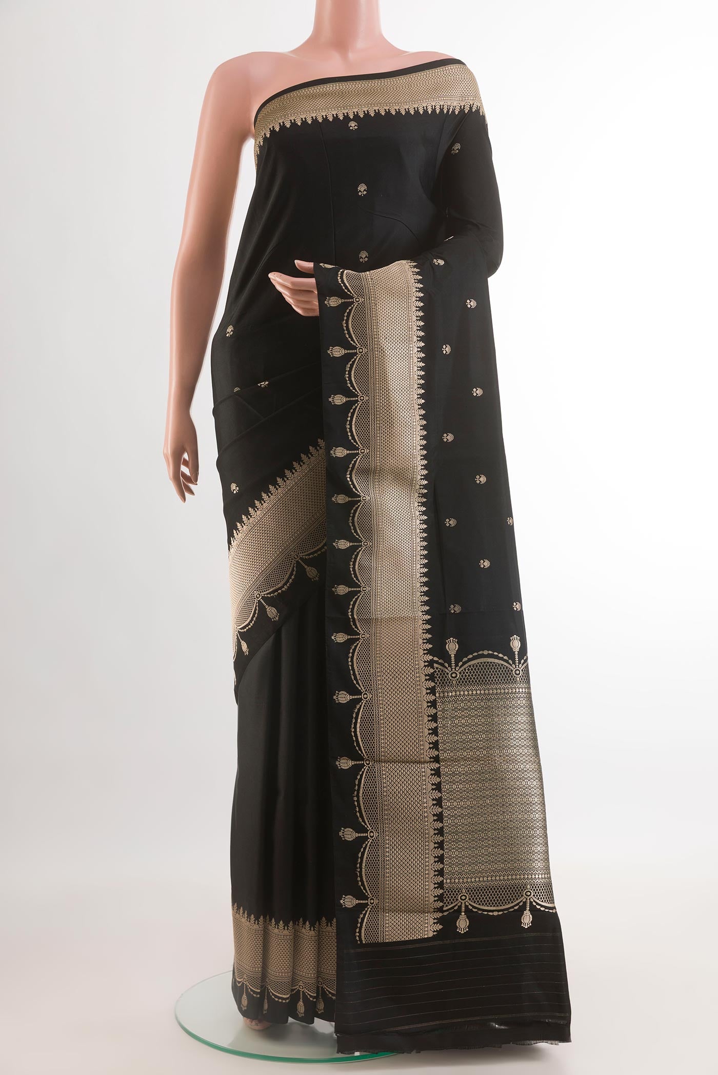 Black Banarasi Silk Saree with Zari Butta on the body and Zari Border.  displayed on a mannequin