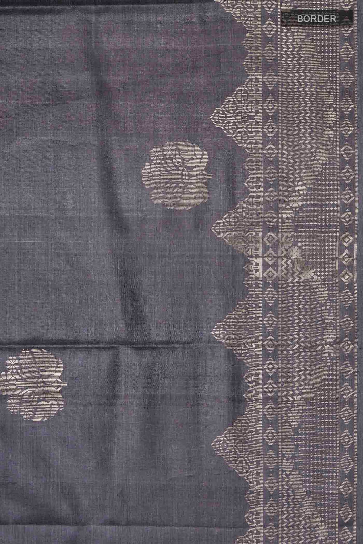 Border image of Grey Tussar Silk Saree with Zari And Thread Butta on the body and Thread Border