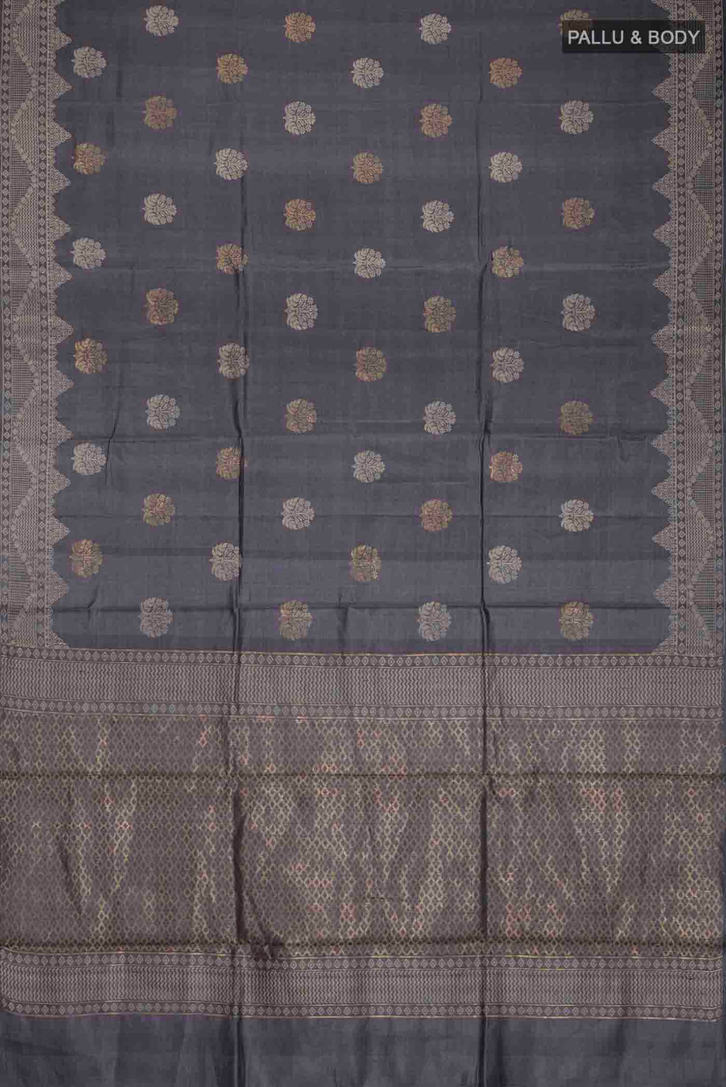 Flat view of Grey Tussar Silk Saree with Zari And Thread Butta on the body and Thread Border