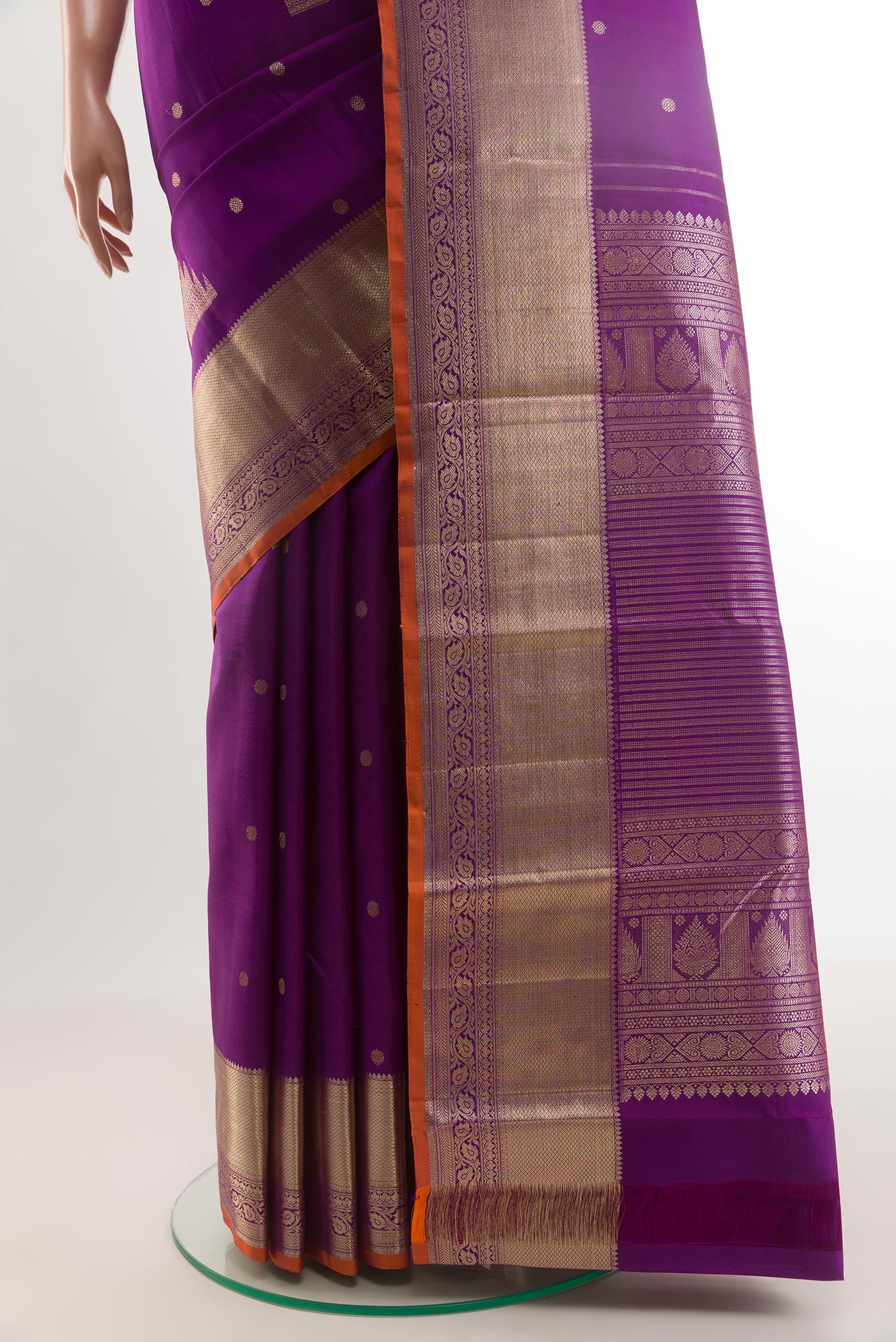 Pleats and pallu of Purple Kanjivaram Silk Saree with Zari Butta on the body and Zari Border. 