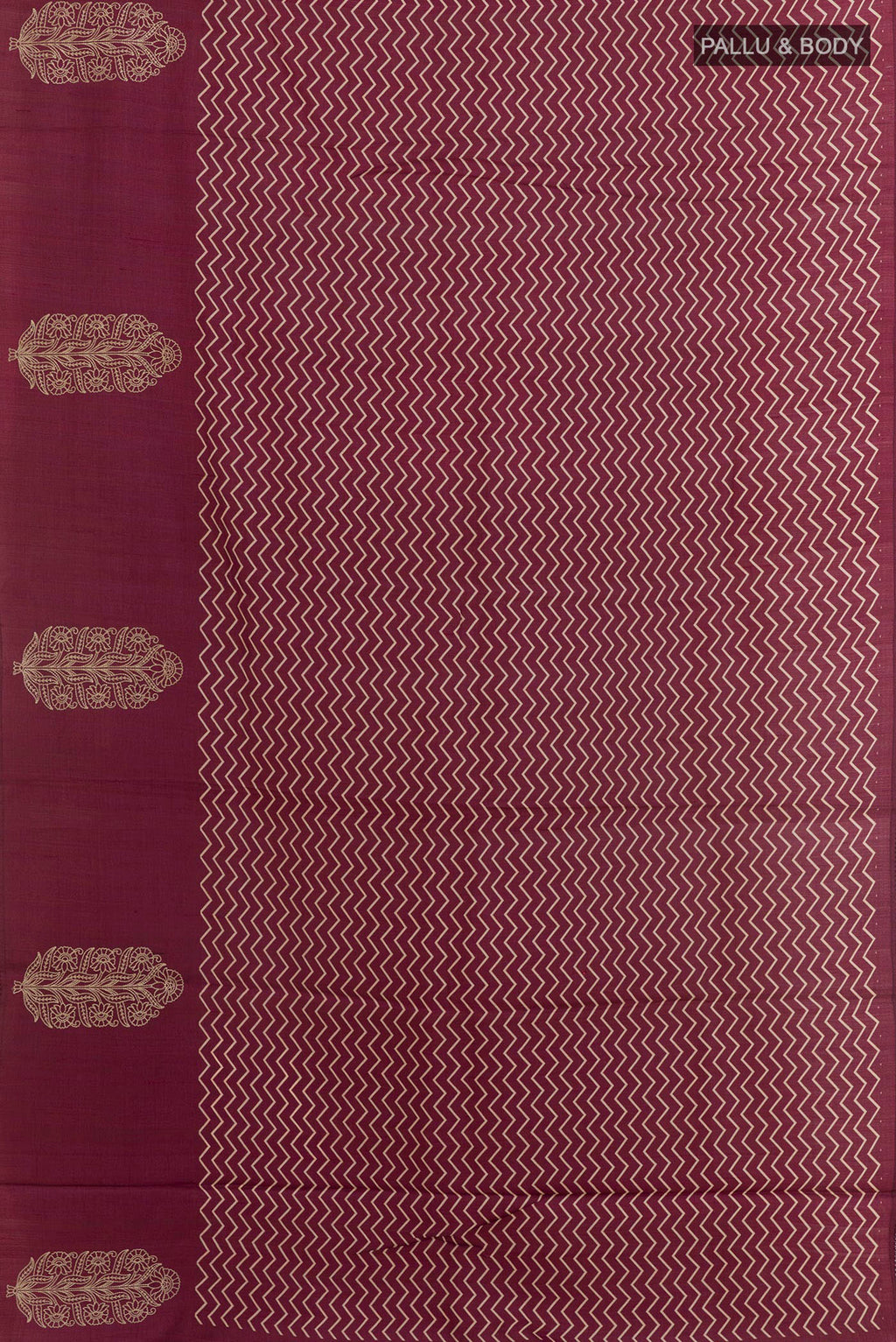 Flat view of Magenta Tussar Saree with Printed design on the body and Zari Border. 