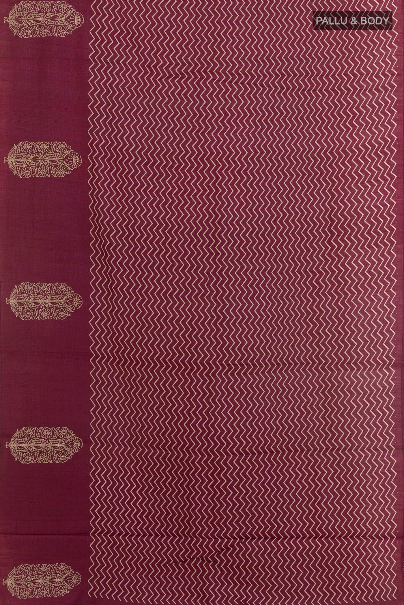 Flat view of Magenta Tussar Saree with Printed design on the body and Zari Border. 