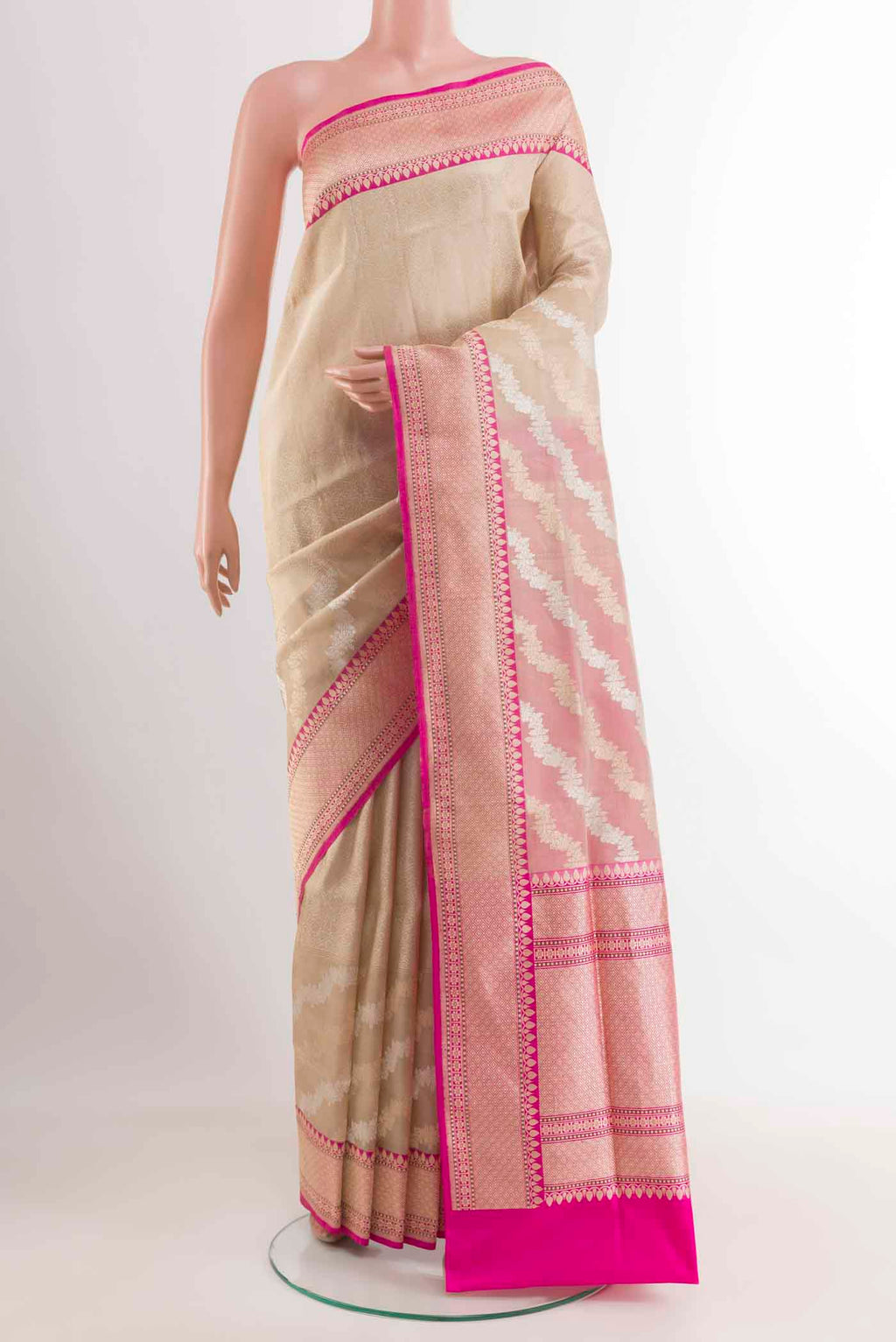 Cream Banarasi Silk Saree with Zari Brocade on the body and Zari Border displayed on a mannequin