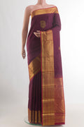 Pure Silk Purple Kanchipuram Saree with Zari Butta on the body and Zari Border.  displayed on a mannequin
