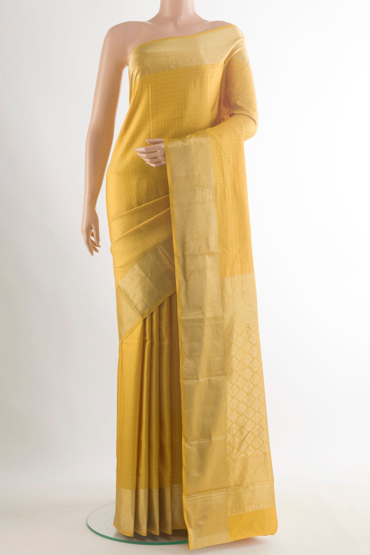 Pure Silk Yellow Kanchipuram Saree with Jacquard With Zari Butta on the body and Zari Border.  displayed on a mannequin