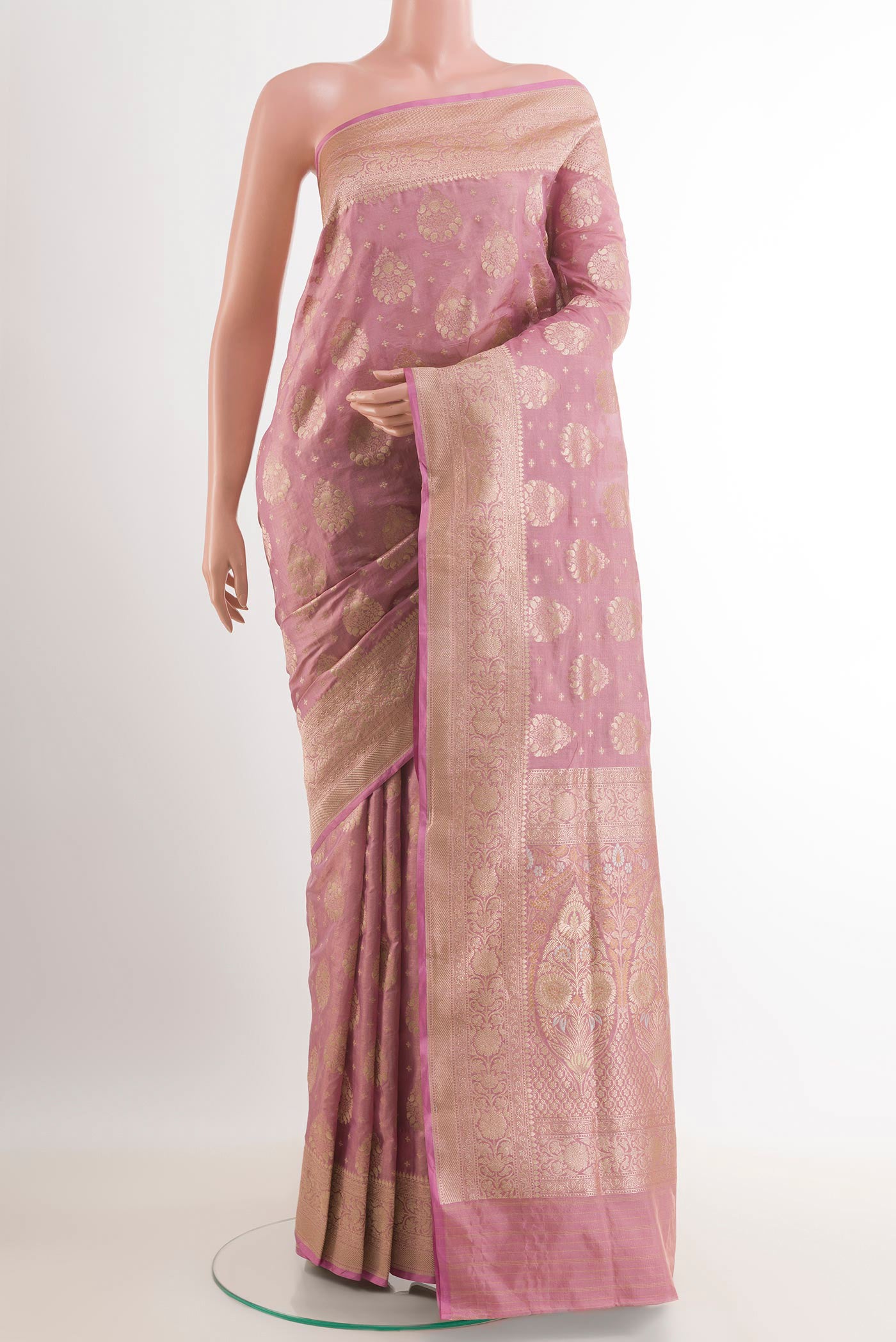 Lavender Banarasi Tissue Silk Saree with Zari Butta on the body and Zari Border.  displayed on a mannequin