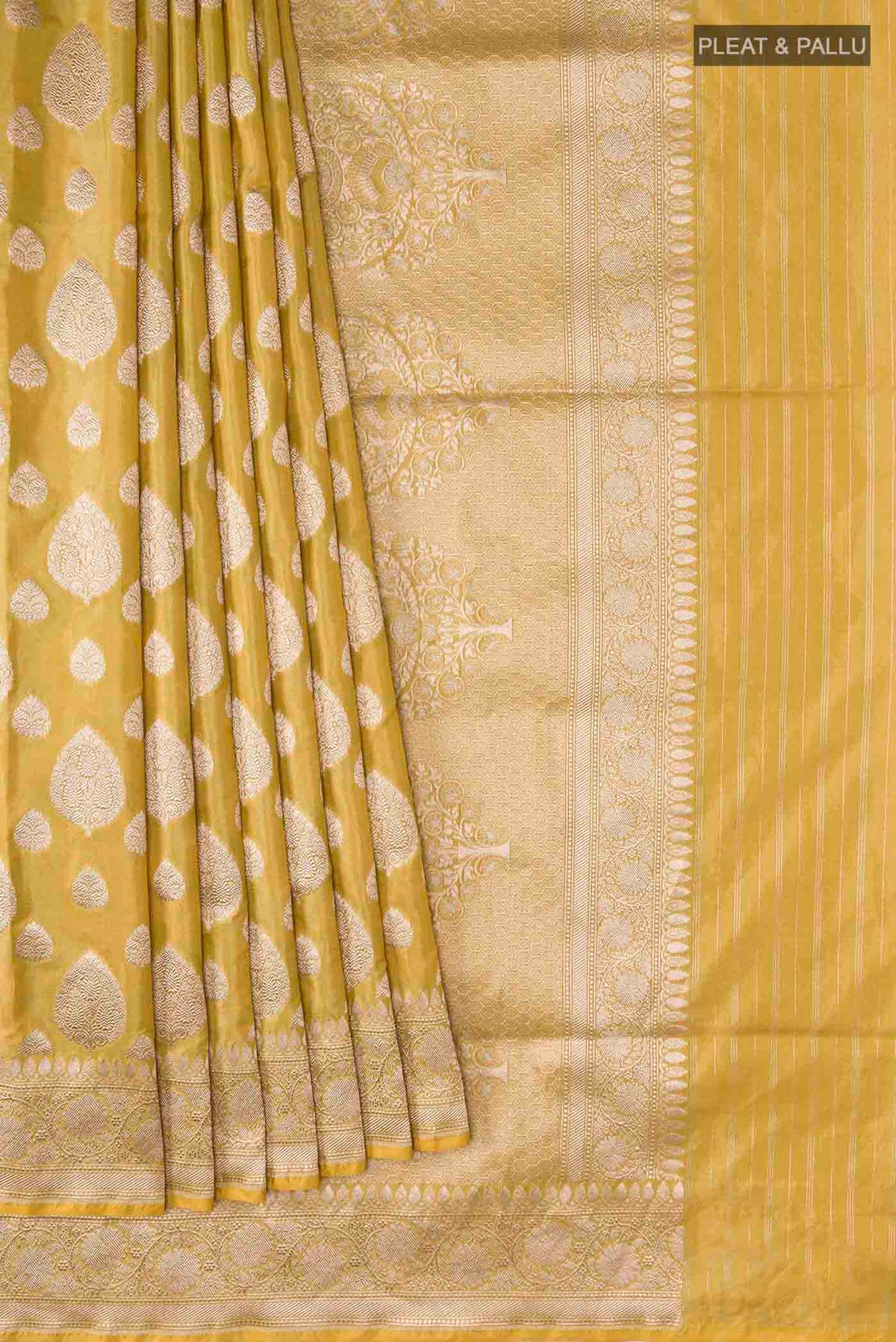 Pleats and pallu of Yellow Banarasi Silk Saree with Zari Butta on the body and Zari Border