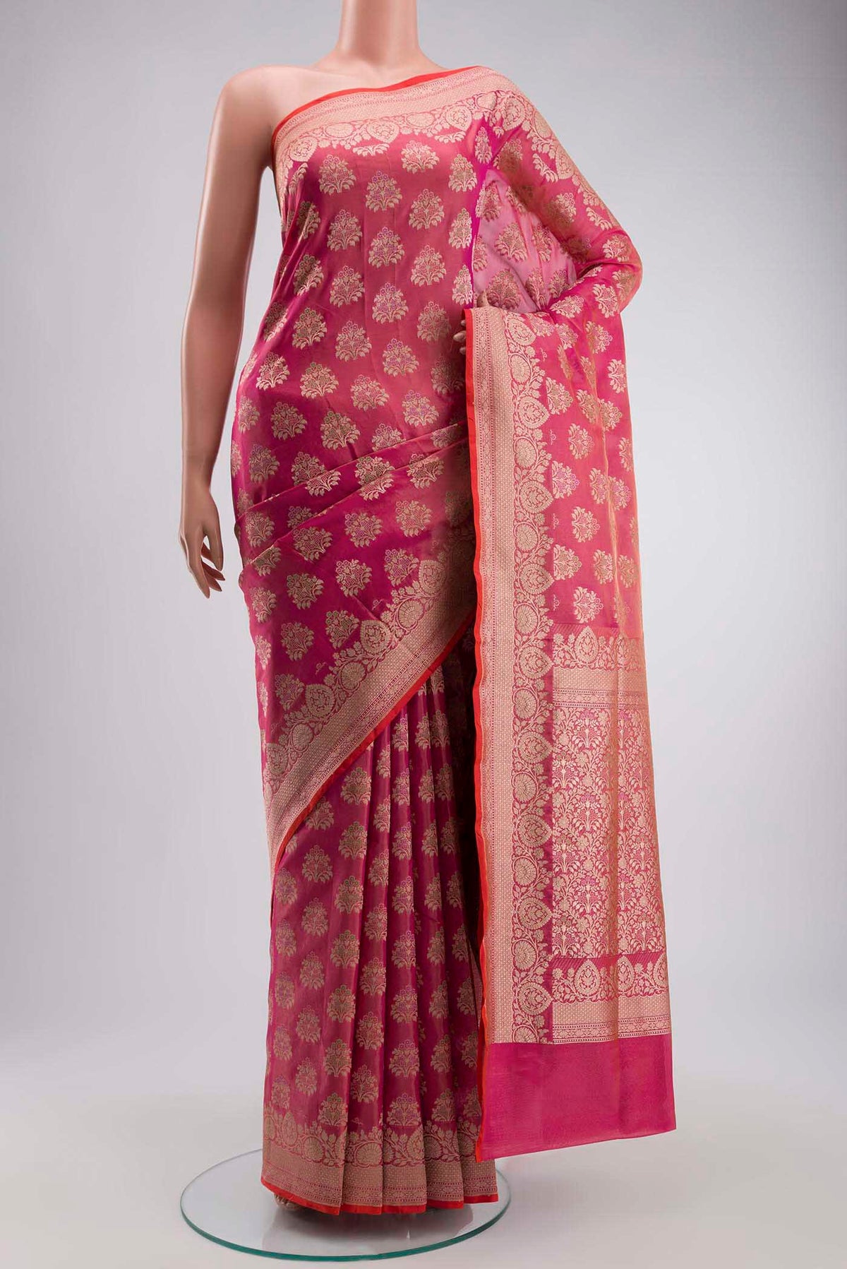 Pink Banarasi Silk Saree with Zari Butta on the body and Zari Border displayed on a mannequin
