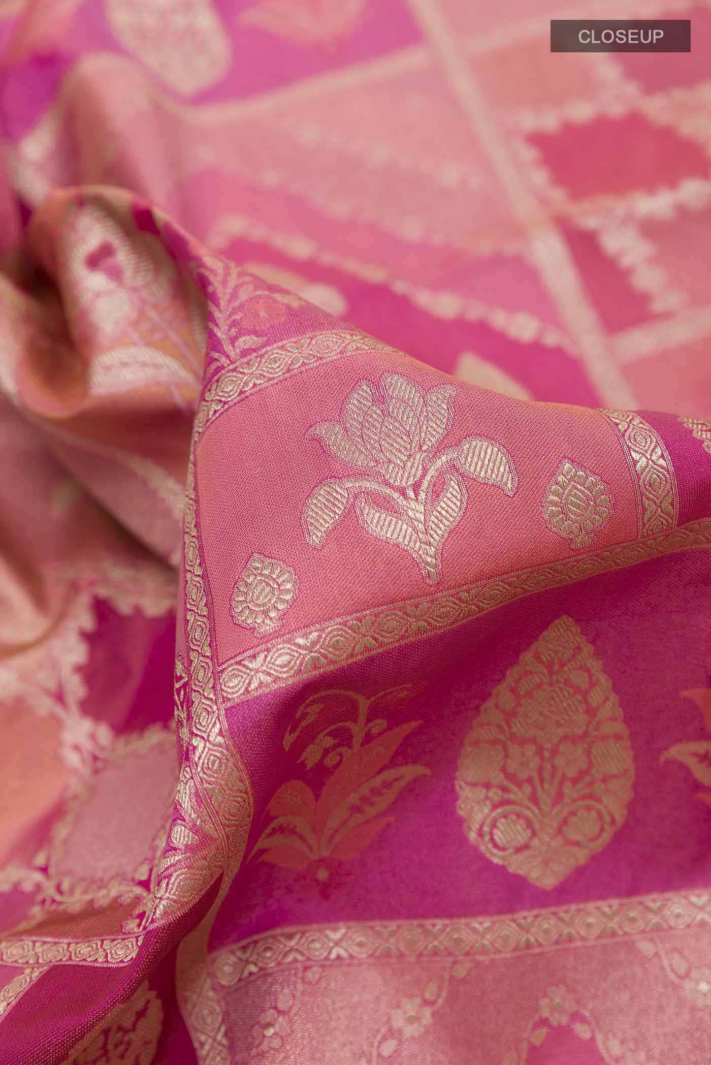 Close up of Pink Banarasi Silk Saree with Zari Brocade on the body and Zari Border displaying folds