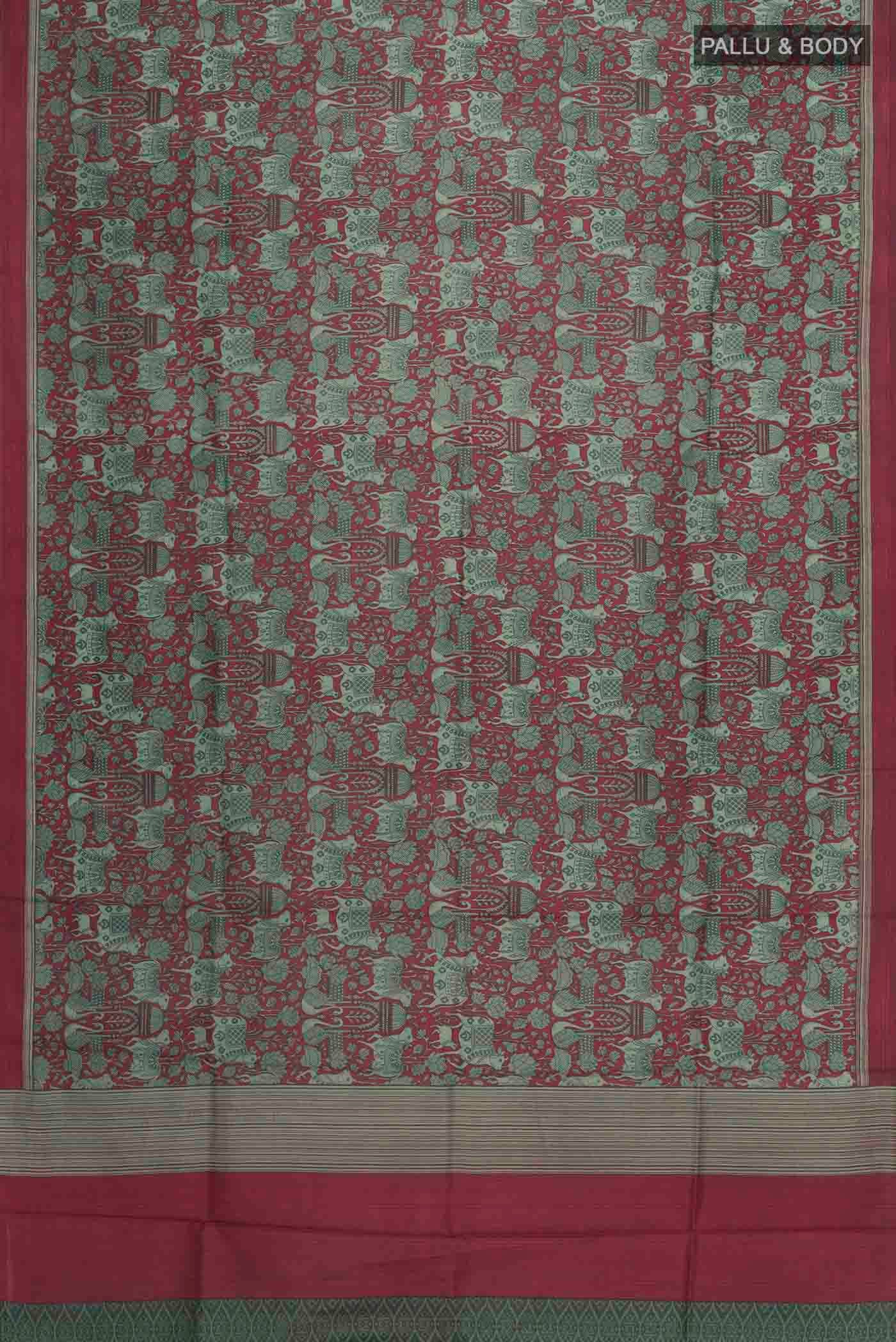 Flat view of Maroon Printed Silk Saree with Printed design on the body and Plain Border