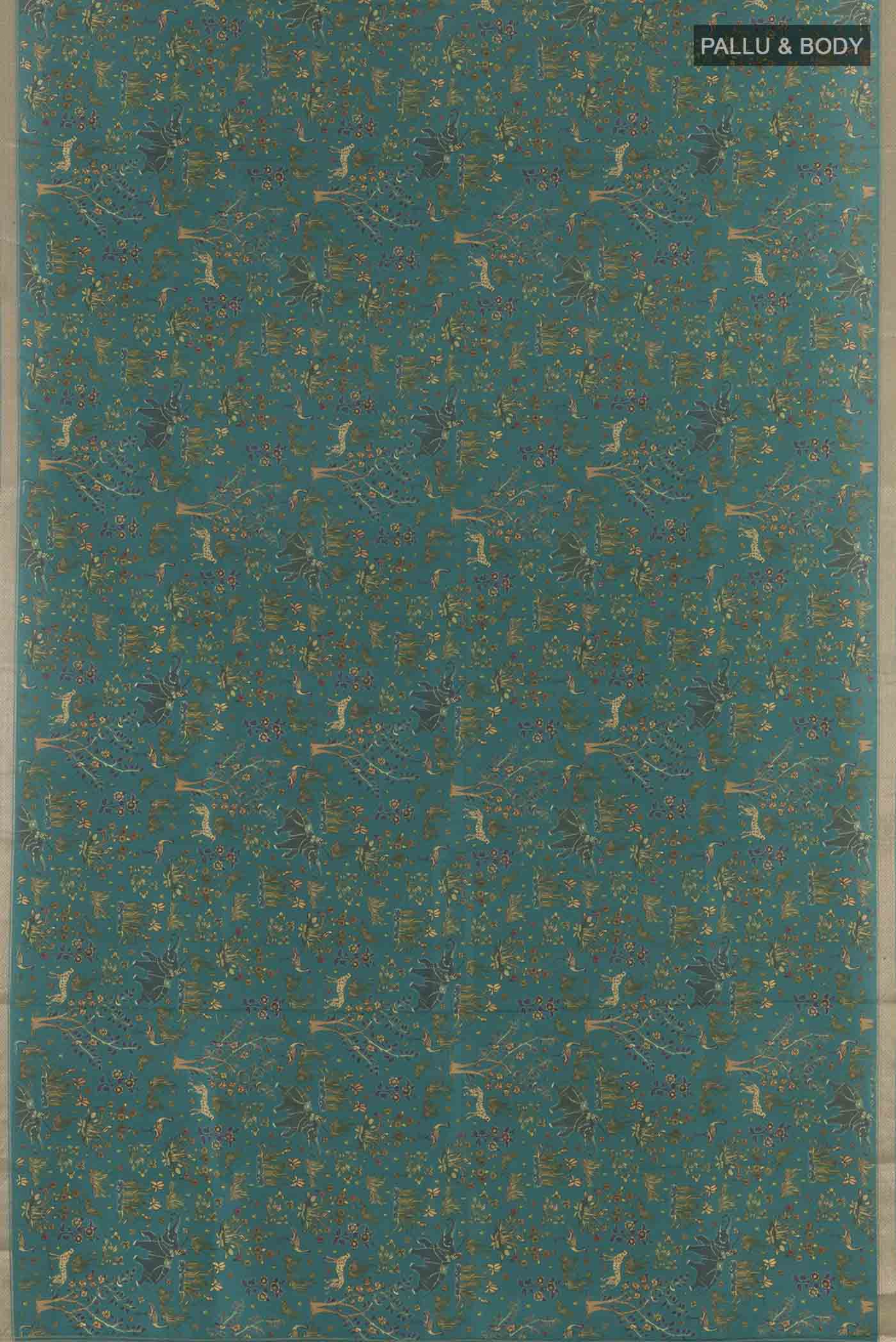 Flat view of Green Printed Silk Saree with Printed design on the body and Zari Border