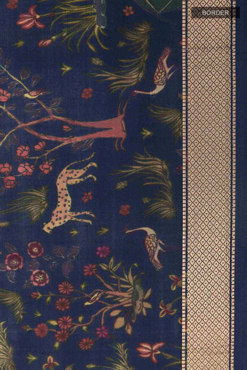 Border image of Blue Printed Silk Saree with Printed design on the body and Zari Border