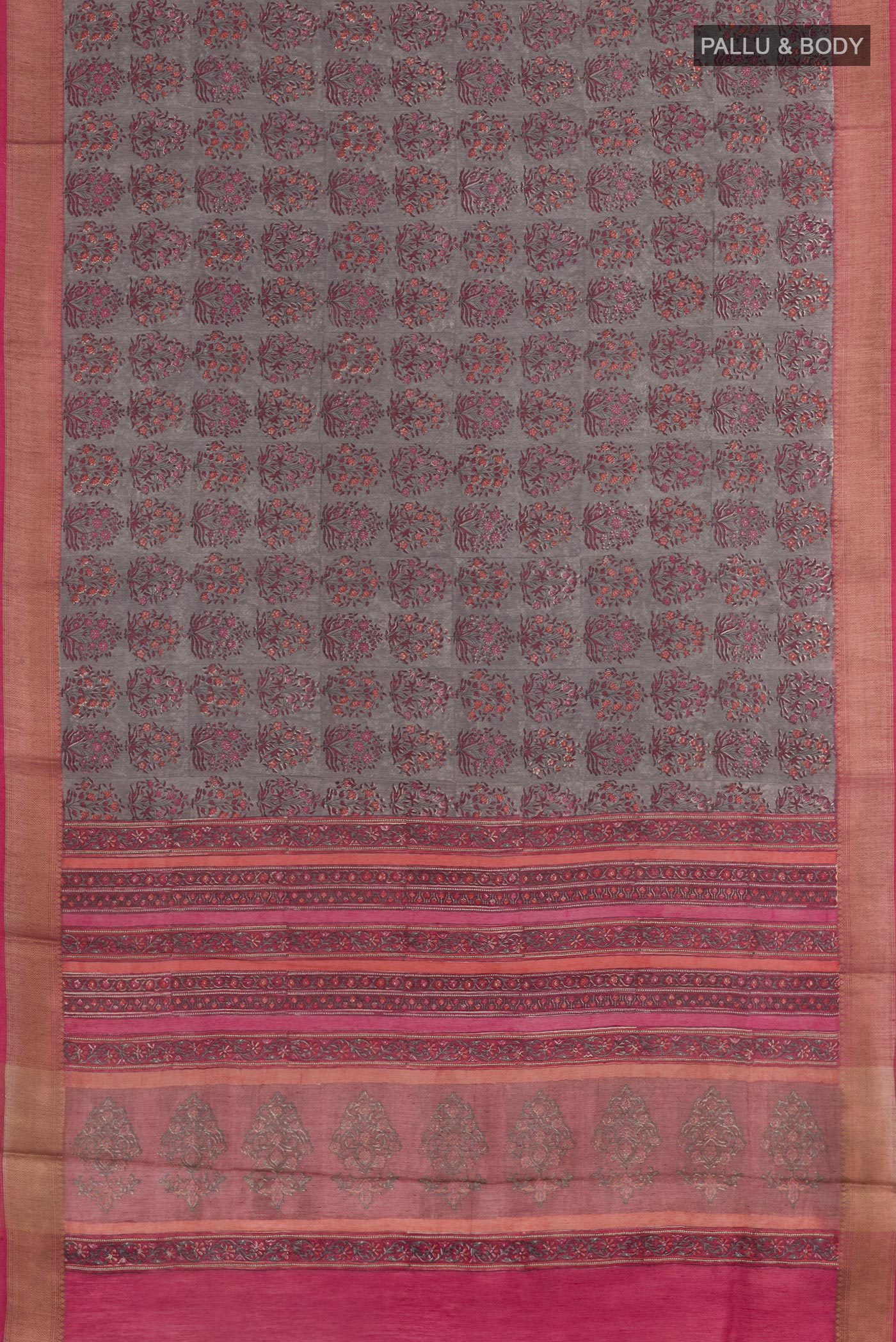 Flat view of Grey Tussar Silk Saree with Printed design on the body and Zari Border. 