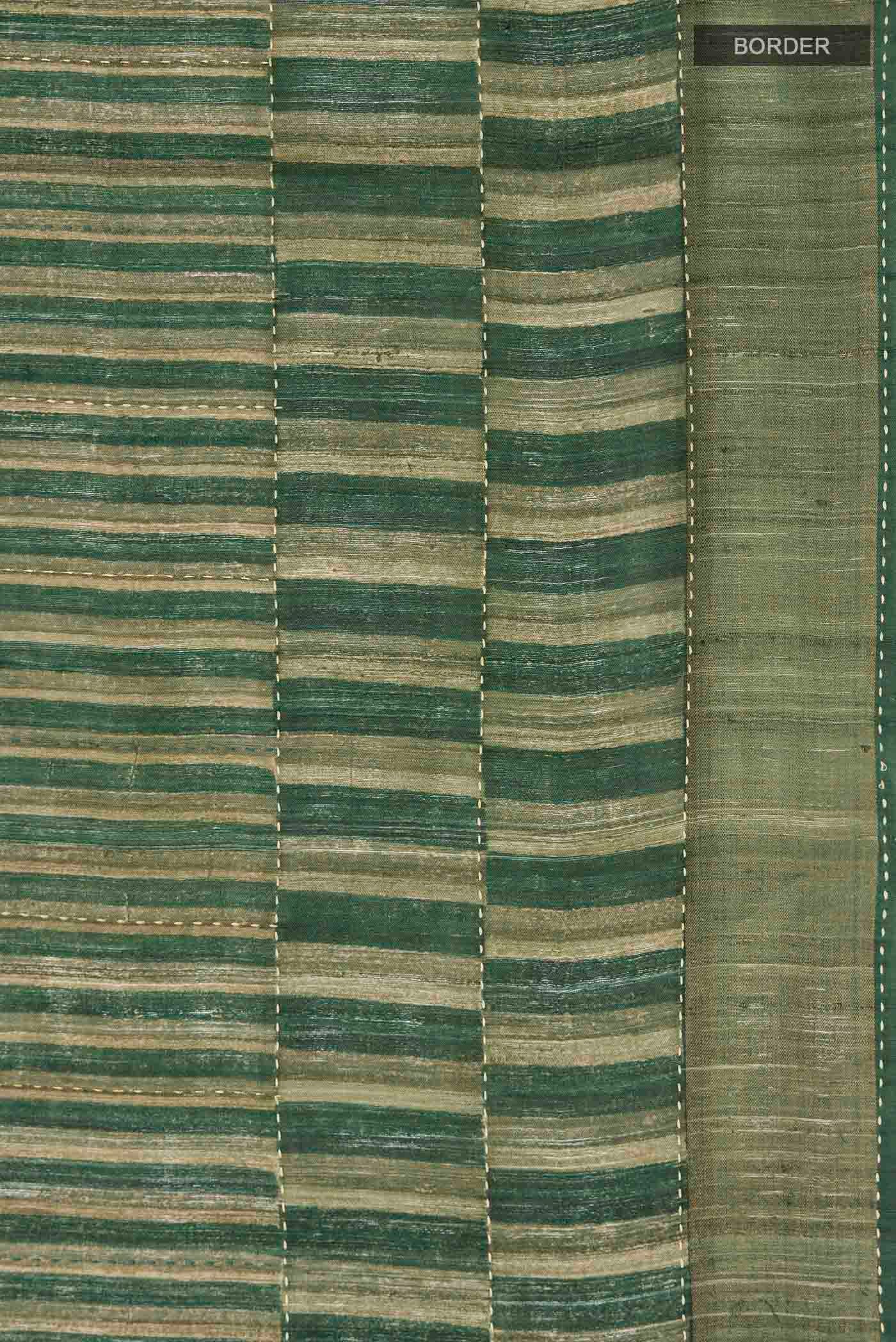 Border image of Green Tussar Silk Saree with Stripes on the body and Zari Border