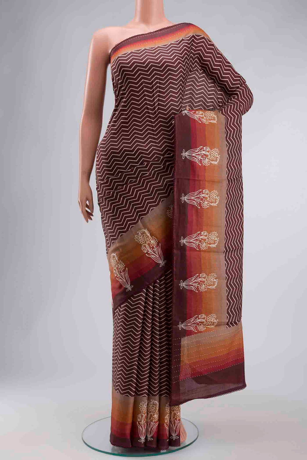 Brown Tussar Silk Saree with Stripes on the body and Thread Border displayed on a mannequin