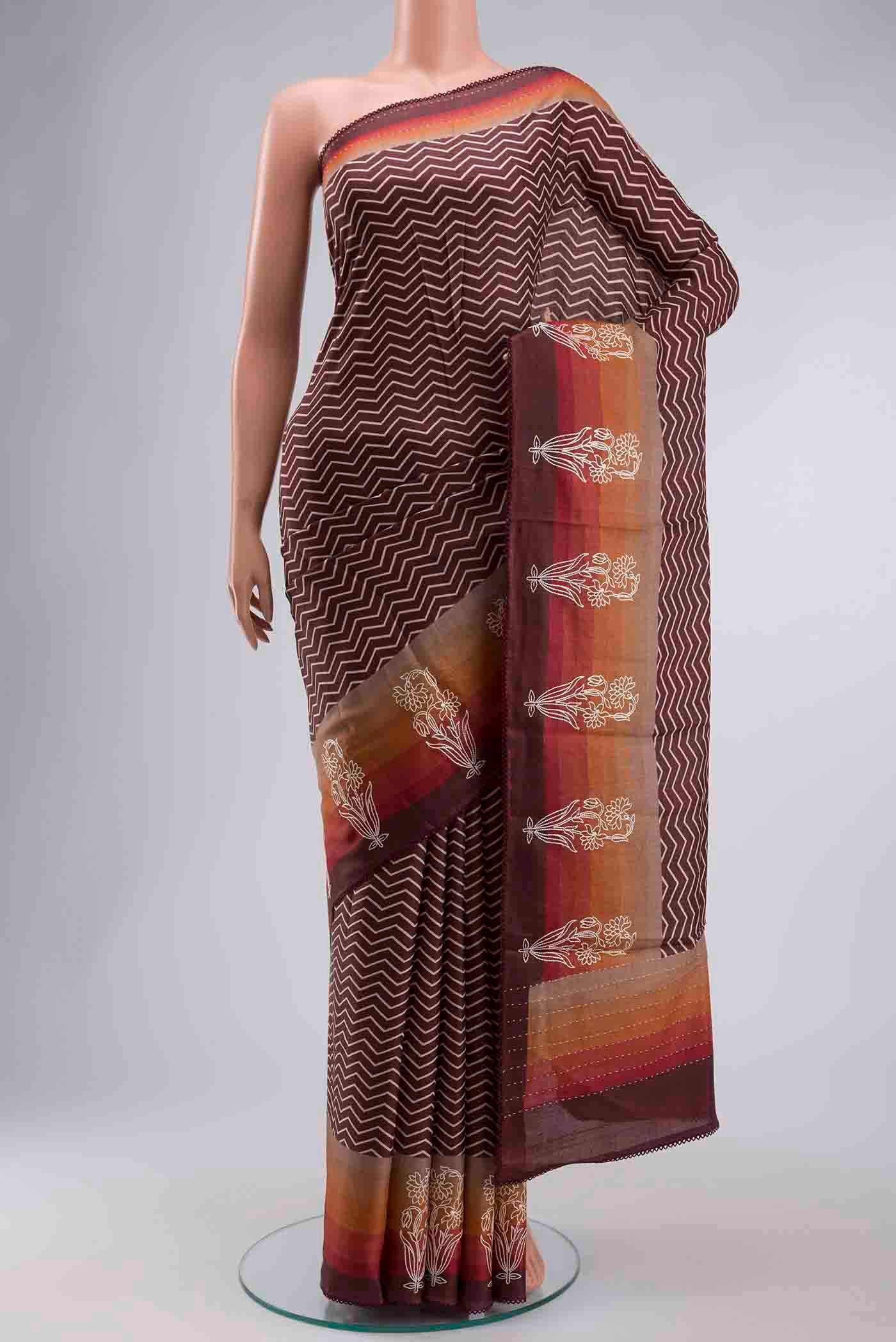 Brown Tussar Silk Saree with Stripes on the body and Thread Border displayed on a mannequin