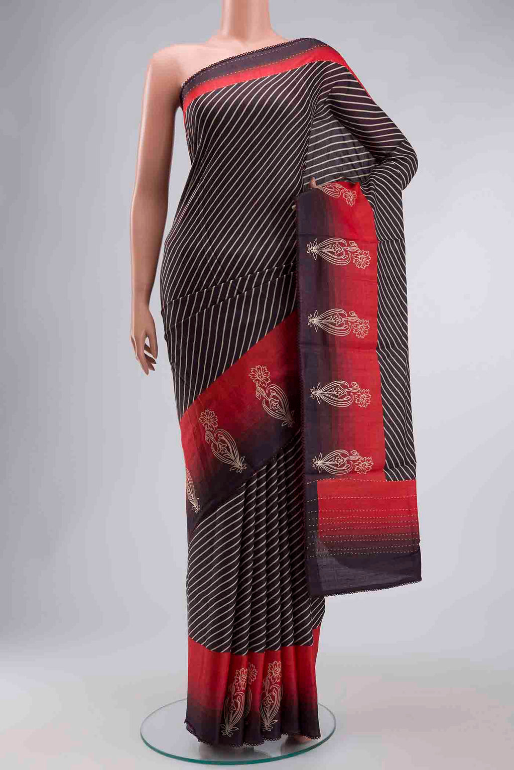 Brown Tussar Silk Saree with Stripes on the body and Embroidery Border displayed on a mannequin
