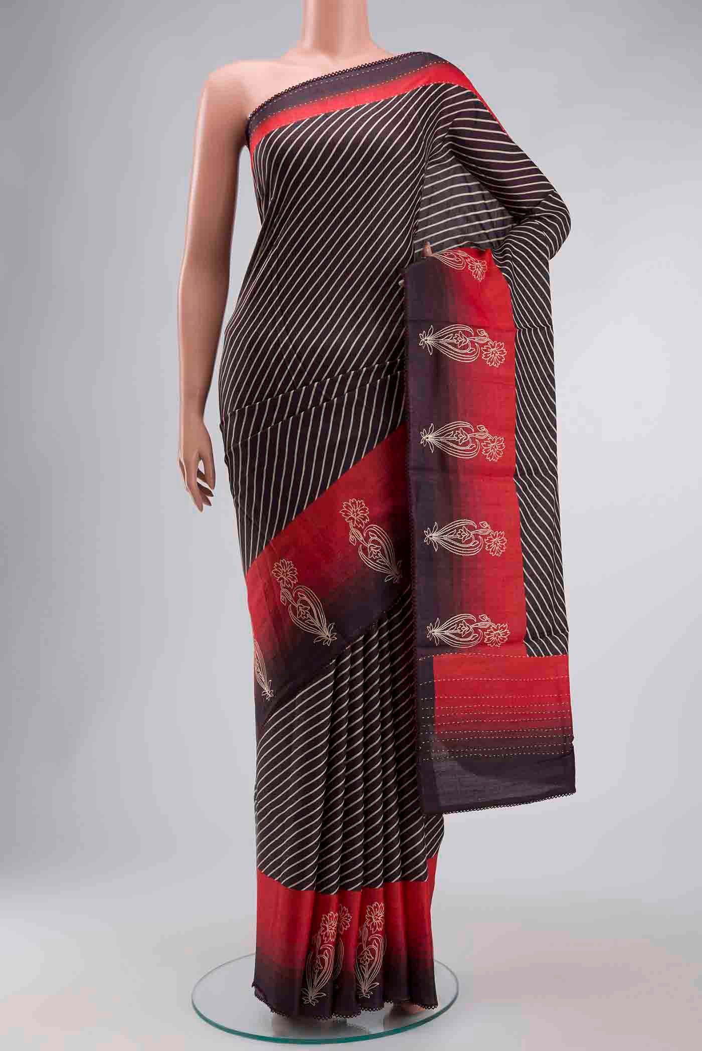 Brown Tussar Silk Saree with Stripes on the body and Embroidery Border displayed on a mannequin