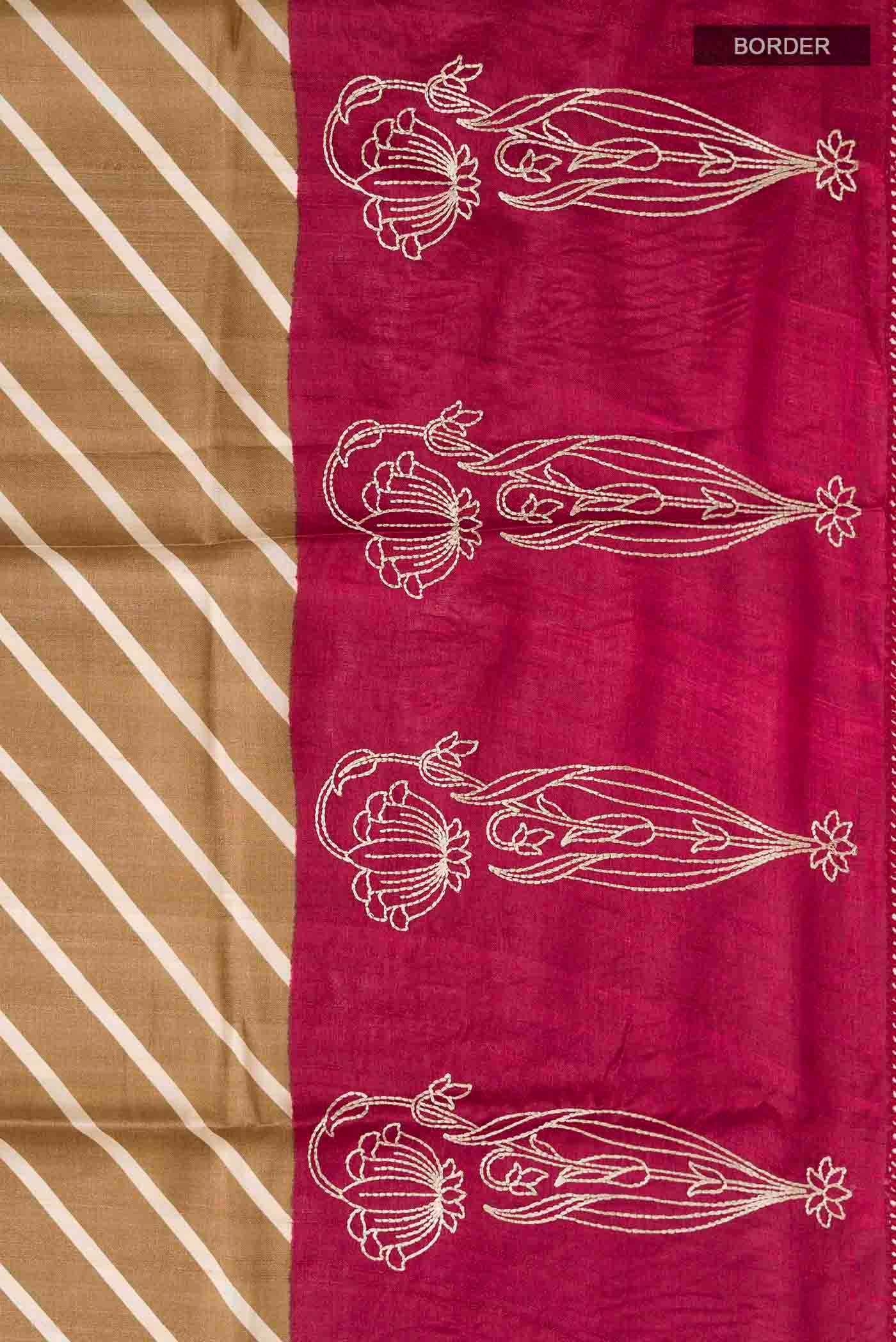 Border image of Green Tussar Silk Saree with Printed design on the body and Embroidery Border