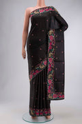 Black Tussar Silk Saree with Embroidery on the body and Embroidery Border displayed on a mannequin