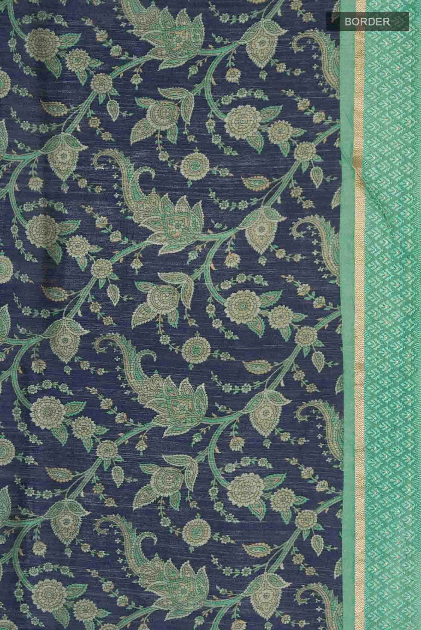 Border image of Blue Tussar Silk Saree with Printed design on the body and Zari Border