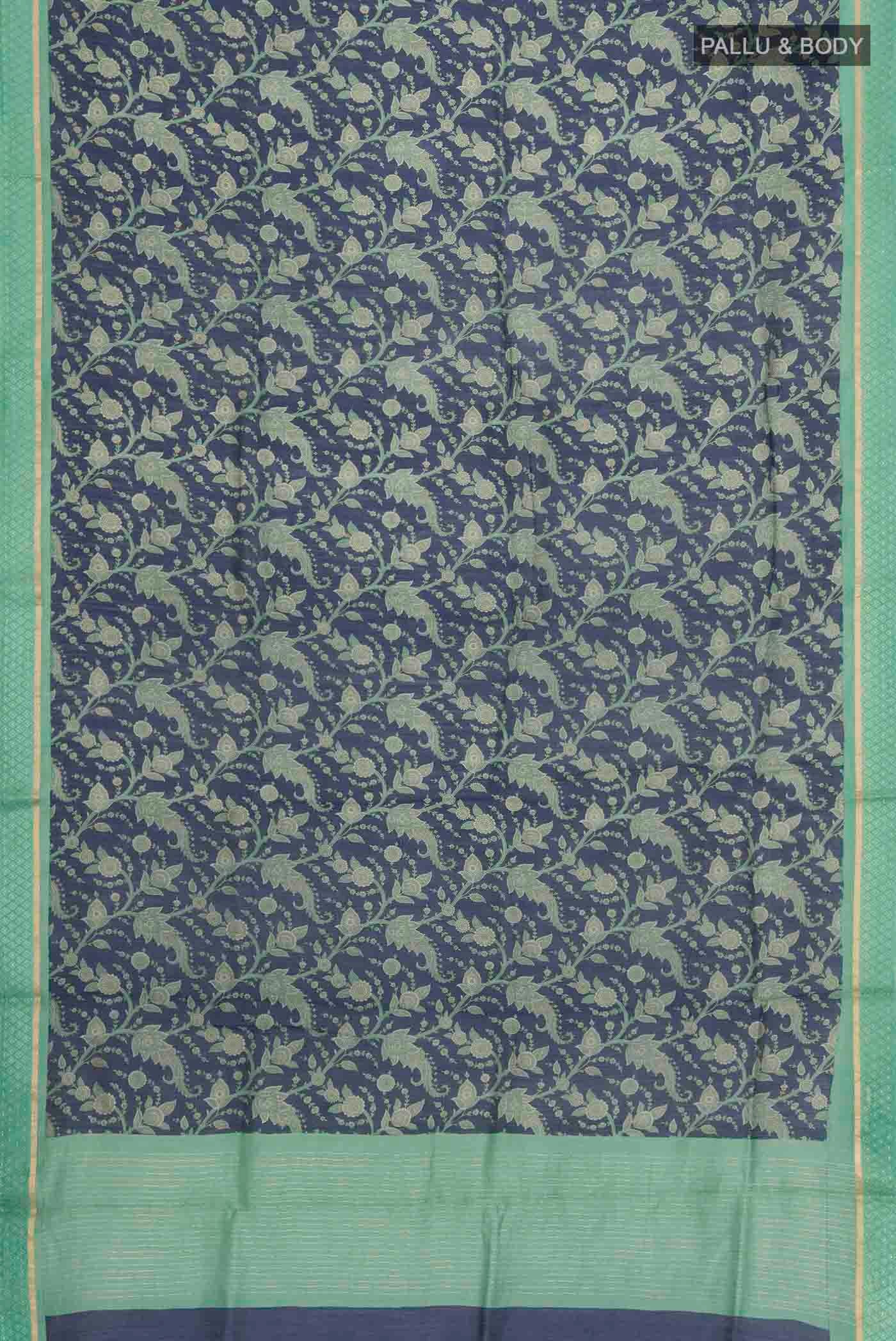 Flat view of Blue Tussar Silk Saree with Printed design on the body and Zari Border