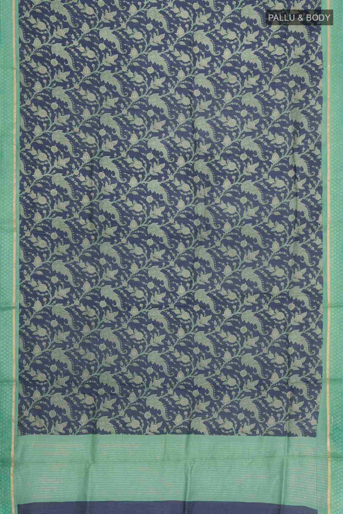 Flat view of Blue Tussar Silk Saree with Printed design on the body and Zari Border