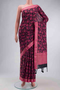 Black Tussar Silk Saree with Printed design on the body and Zari Border displayed on a mannequin