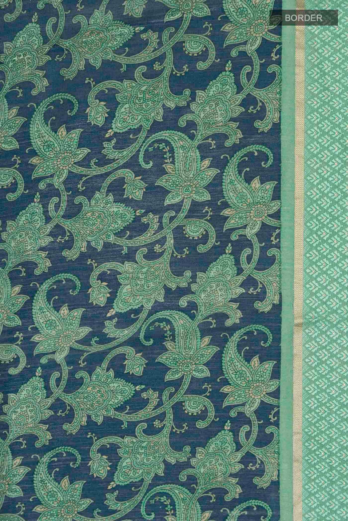 Border image of Blue Tussar Silk Saree with Printed design on the body and Zari And Thread Border