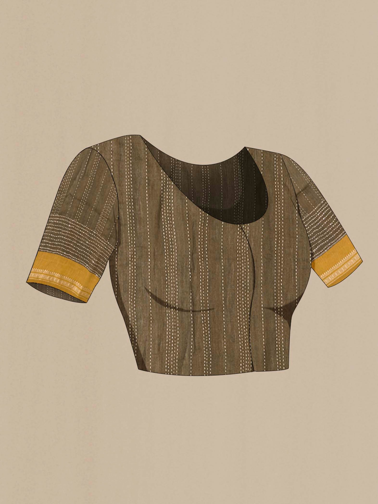 Close up image of the blouse of Green Tussar Silk Saree with Embroidery on the body and Zari Border