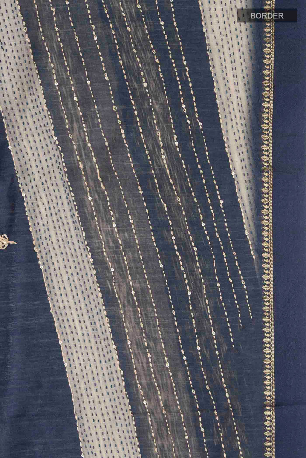 Border image of Maroon Tussar Silk Saree with Embroidery on the body and Zari Border