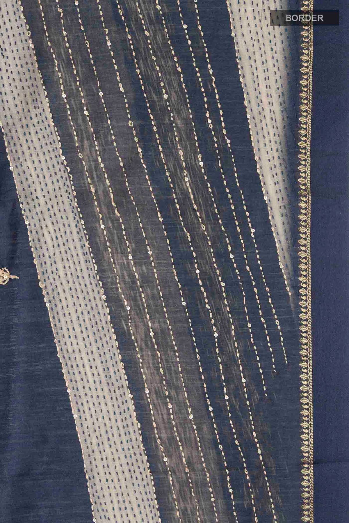 Border image of Maroon Tussar Silk Saree with Embroidery on the body and Zari Border