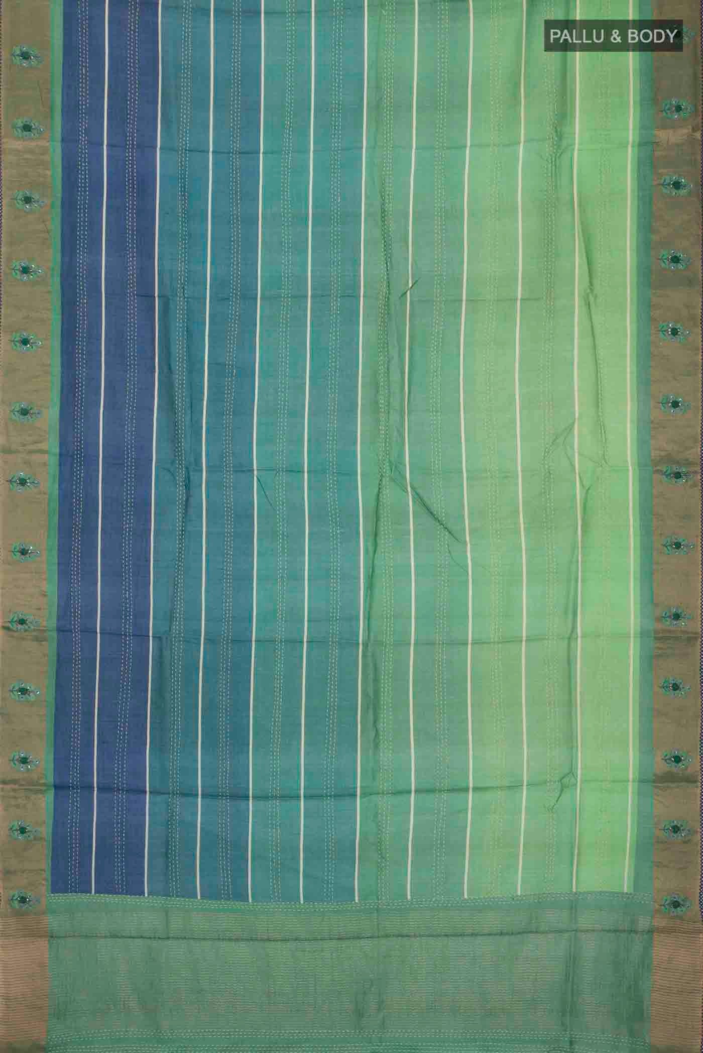 Flat view of Green Tussar Silk Saree with Embroidery on the body and Zari Border